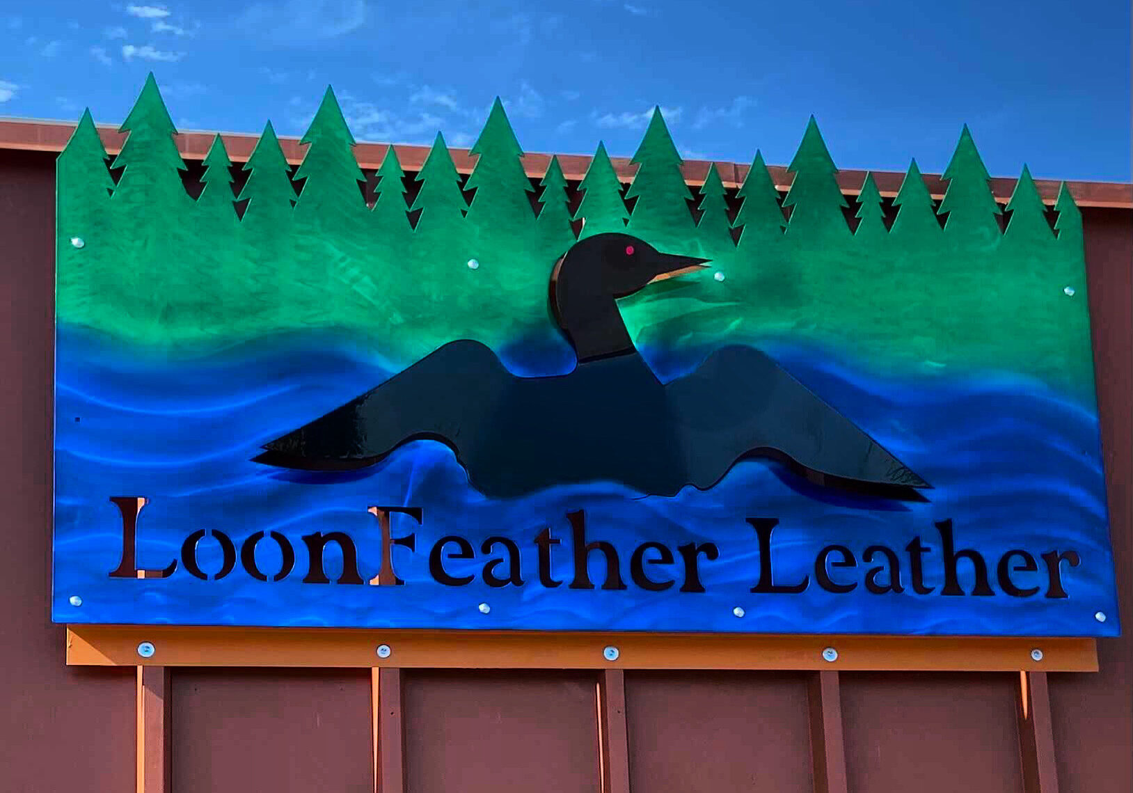loonfeather leather sign outdoors